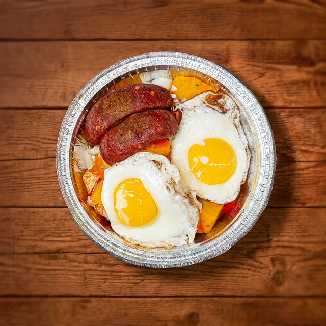 Choice of Meat and Eggs Breakfast (Desayuno con Opción de Carne y Huevos).